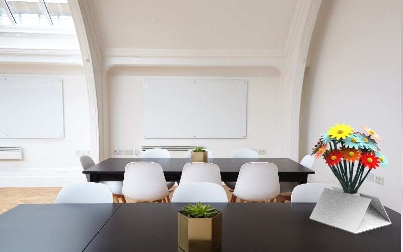 On the meeting table.